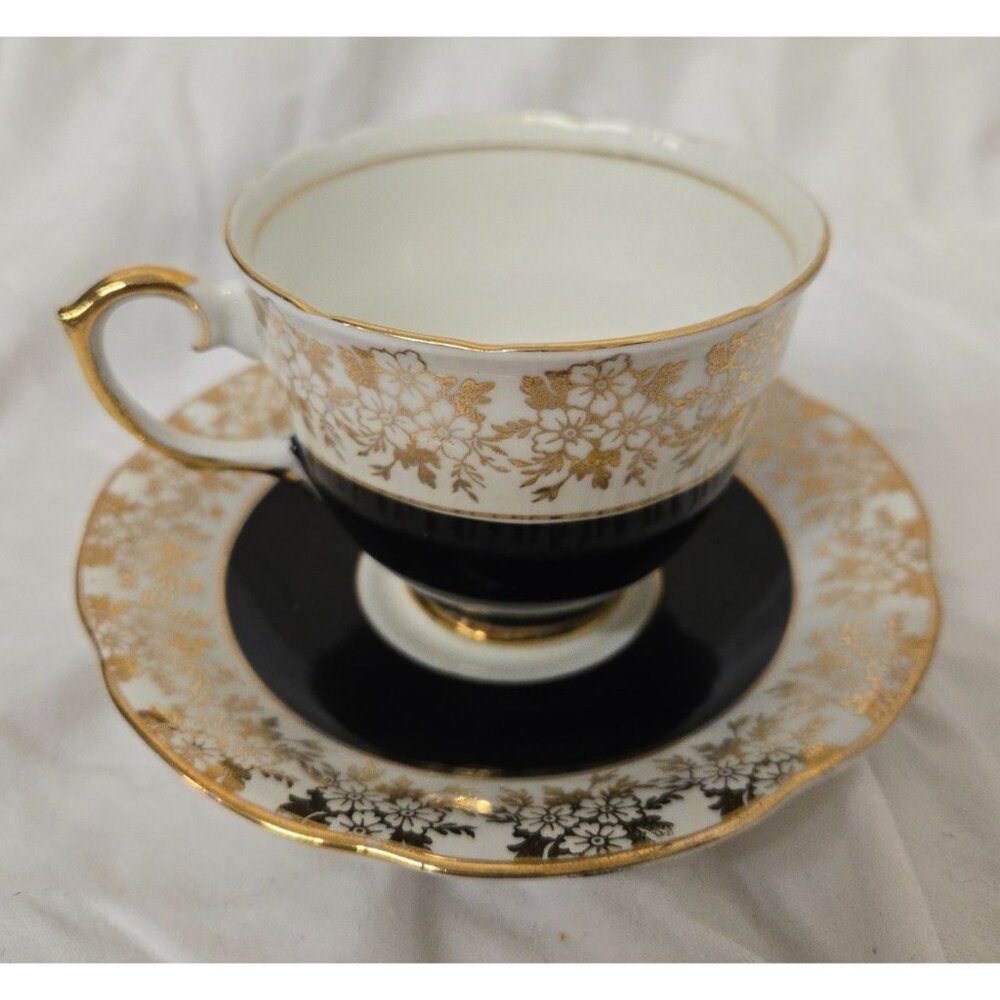 Vintage Royal Stuart Spencer Stevenson Tea Cup & Saucer England Gold & Black